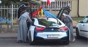 Nuns in Poland driving a BMW i8