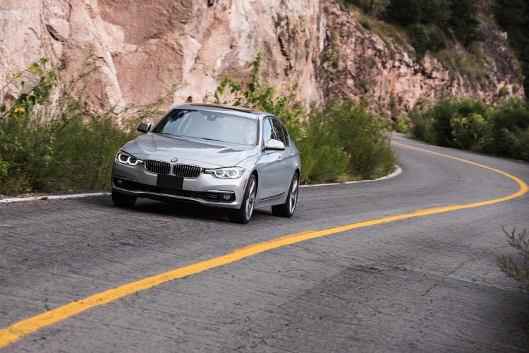 BMW 340i vs Jaguar XE 35t R-Sport by Road & Track