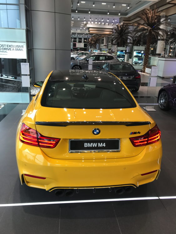 Speed Yellow BMW M4 in Abu Dhabi Dealership