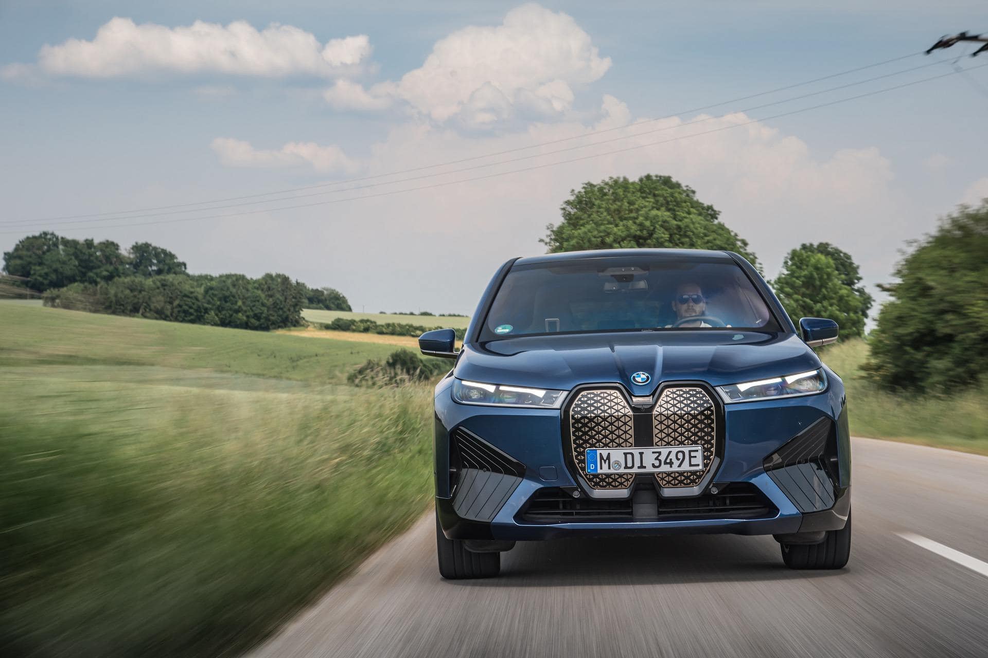 All-new BMW iX sporting in Phytonic Blue - BMW.SG